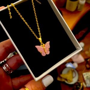 NWT 2 for 1 special!!! Beautiful butterfly opal &emerald birthstone necklaces!